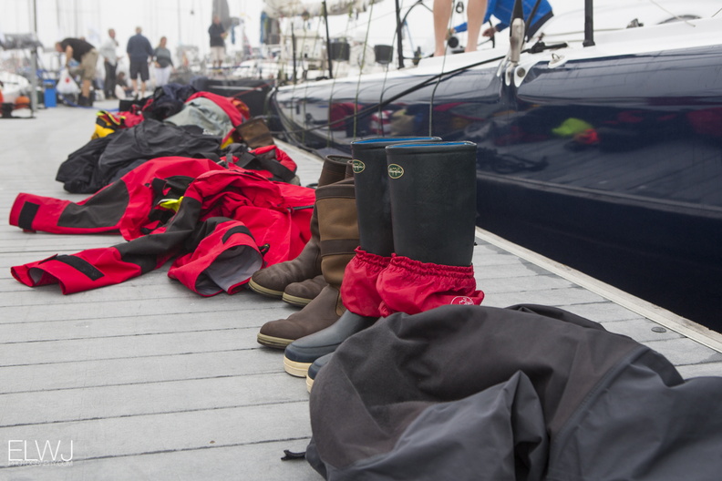 Wet weather gear on the pontoons after the race
