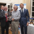 Peter Hopps, skipper of Saga, with the trophy for winning IRC One