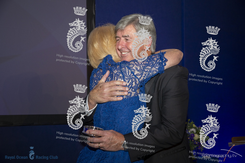 Janet Grosvenor accepts an honorary award from RORC CEO Eddie Warden Owen