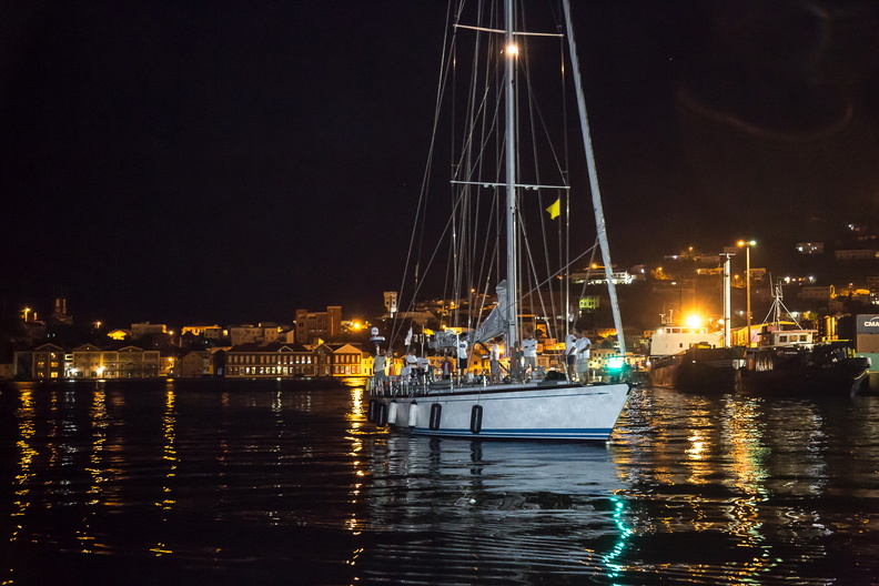 Yacana against the bright lights of Port Louis Marina, Grenada