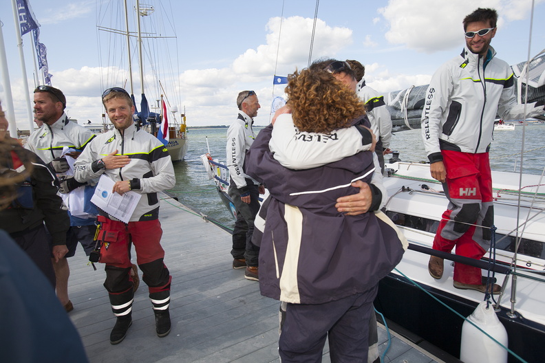 A welcoming hug for a crew member
