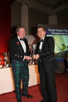 Vice Commodore, Tom Hayhoe, collects the Oldland Watts Aquadanca Trophy on behalf of Nigel Goodhew, Persephone of London