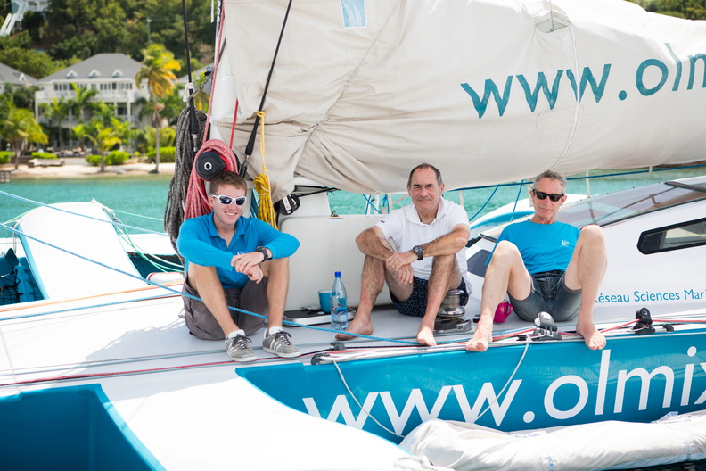 Taking a break in the heat of the Antiguan sun, the crew of Olimx
