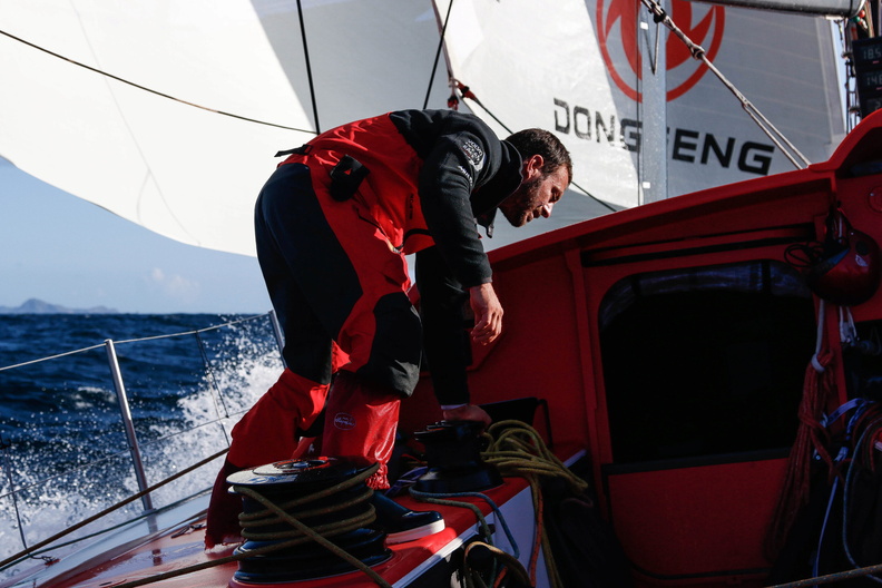 Despite the beautiful blue sky the Volvo Ocean 65 is maintaining a vigorous speed in the race