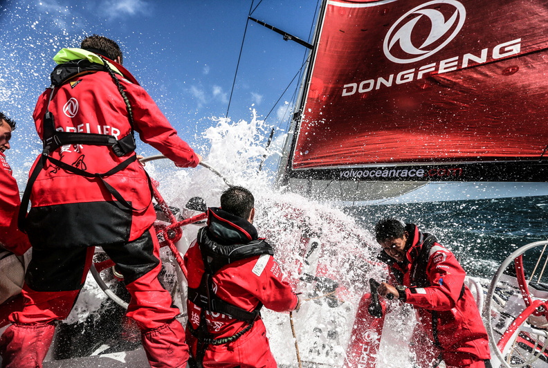 Taking a wave head on, onboard Dongfeng on Day One