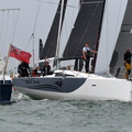 Trevor Middleton's Sun Fast 3600 Black Sheep passes the Committee Boat