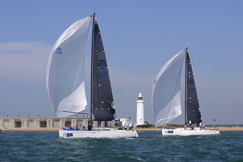 Quokka 8 and Nutmeg Sparkling Charter keep close together as they pass Hurst Castle