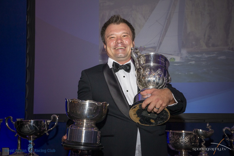 Yuri Fadeev, owner of Capstan Sailing School collects the David Fayle Memorial Cup for Best Sailing School Yacht for Skylander