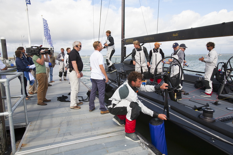 RORC Racing Manager, Nick Elliott, greets the crew onboard Varuna