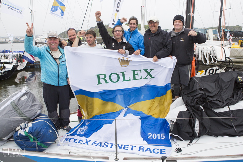A team celebrates finishing the 2015 Rolex Fastnet Race