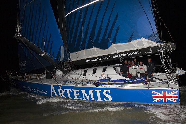 Beaming faces onboard the IMOCA 60, having set a new record for a boat of that length