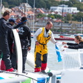 Damian Foxall is handed the event backstay flag