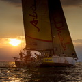 Against a beautiful setting sun, Azzam comes in to finish the race in Cowes