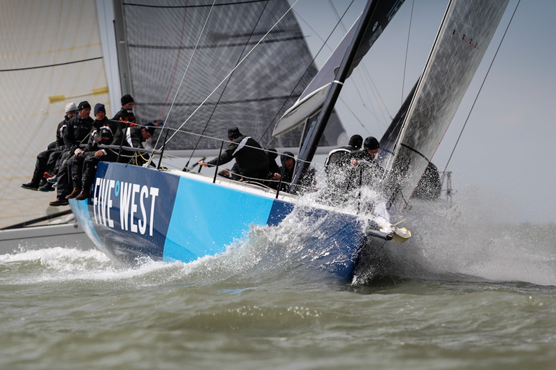 TP 52, 5 West, cuts through the Solent on their way to another win