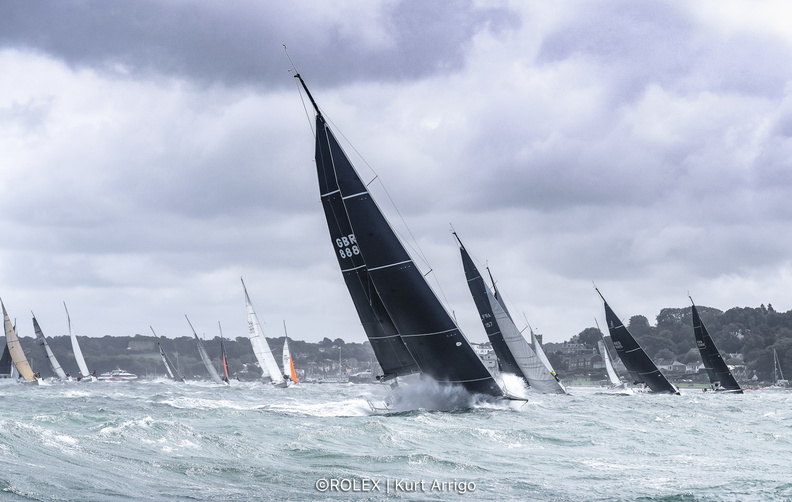 Sunrise, Thomas Kneen's JPK 11.80 charges through the waves off Cowes