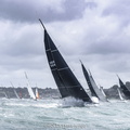 Sunrise, Thomas Kneen's JPK 11.80 charges through the waves off Cowes