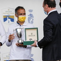 Accepting the prize for Multihull Line Honours from Rolex representative Lionel Schurch