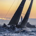 George David's Rambler 88 approaches the Fastnet Rock