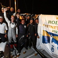 RORC Commodore James Neville and his crew of INO XXX celebrate finishing the Rolex Fastnet Race