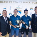 Antoine Magre of Palanad 3 accepts the prize for first Class40 from James Neville, RORC Commodore, and in-coming CEO Jeremy Wilton