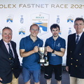 Antoine Magre of Palanad 3 accepts the prize for first Class40 from James Neville, RORC Commodore, and in-coming CEO Jeremy Wilton