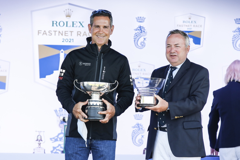 Fernando Echávarri, skipper of Skorpios collects their prize of the Erivale Cup for first yacht home (IRC Zero) and the Irish Lights Trophy for 1st yacht on the water