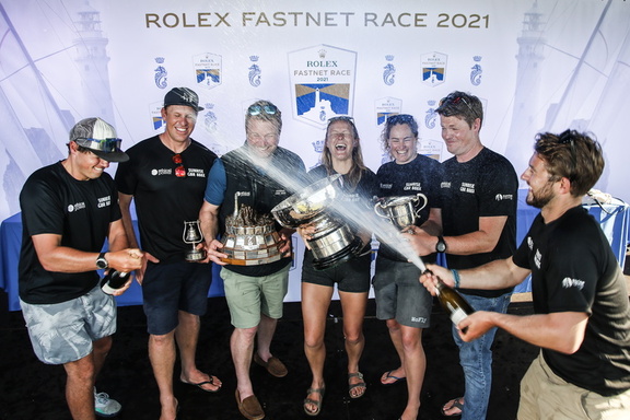 The crew of Sunrise, the Fastnet Challenge Cup winning JPK 11.80, celebrate in style