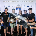 The crew of Sunrise, the Fastnet Challenge Cup winning JPK 11.80, celebrate in style
