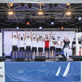 I Love Poland lead the mexican wave as they collect the Gesture Trophy for BCT in IRC Canting Keel and the Joe Powder Trophy for Best IRC Yacht round the rock on corrected time