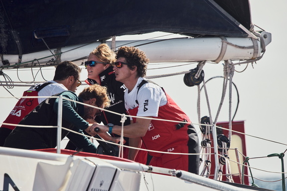 Trimming the sails on board Maserati