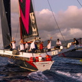 Crew on board celebrate as they cross the line in Grenada