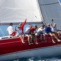 Crew on the rail as Oyster 48, Scarlet Oyster, heads for the finish line
