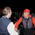RORC CEO Jeremy Wilton greets Mitch Booth at the end of the race