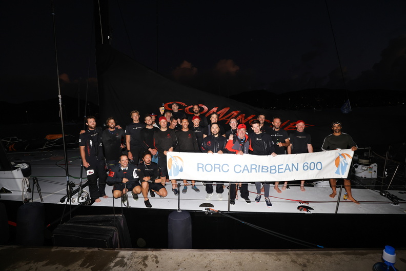 100ft maxi Comanche's crew gather on deck for the team photo