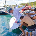 There is high spirits among the crew and their friends as the local boat returns to Antigua 