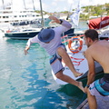 There is high spirits among the crew and their friends as the local boat returns to Antigua 