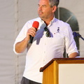 Race Manager Chris Stone speaks to the crowds at the prize-giving