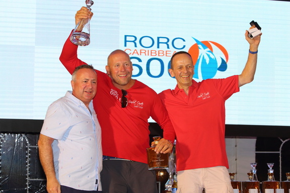 Ross Applebey, owner of Oyster 48 Scarlet Oyster, collects his prize for 1st in IRC Two and 2nd in CSA Two