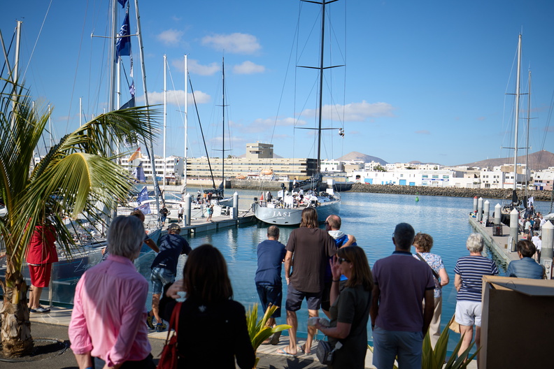 Wellwishers come to watch the departing yachts