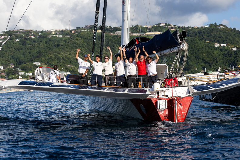 Maserati crew gather on deck as they approach the dock