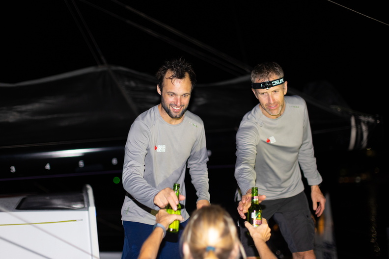 Scott Shawyer & Alan Roberts, after racing doublehanded across the Atlantic, celebrate with their welcome beers