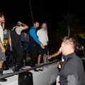 The crew of Black Pearl relax on the dock in Grenada