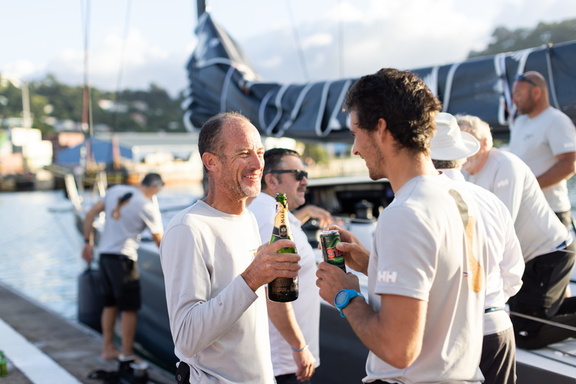 Crew celebrate on the dock in Grenada