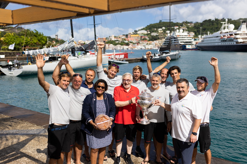 The crew of Teasing Machine celebrate ashore in Grenada after their IRC Overall win in the RORC Transatlantic Racea