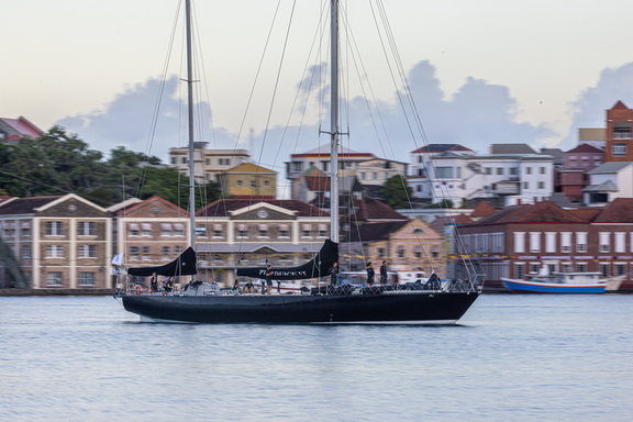 Pen Duick VI arrives in the early hours into Port Louis Marina