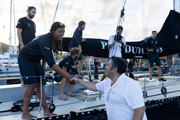 RORC Racing Manager Steve Cole welcomes Marie and her team on board Pen Duick VI