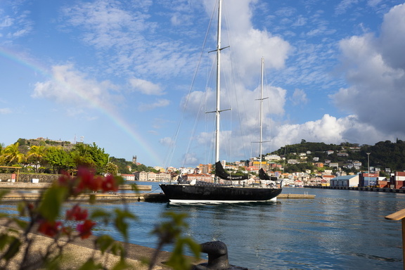 Pen Duick VI at the end of a rainbow in Grenada
