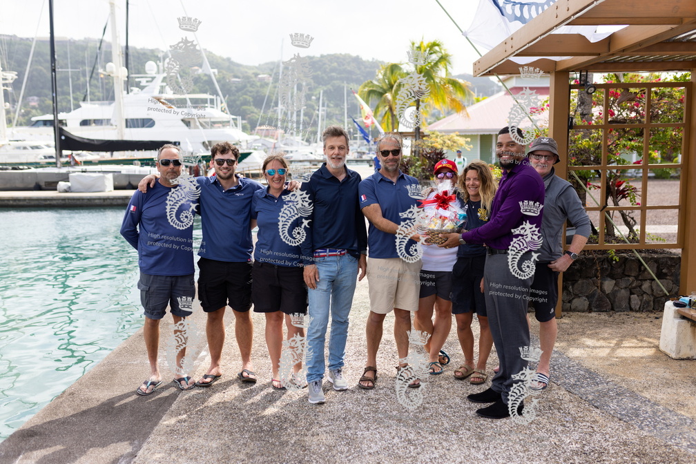 Yagiza's crew are gifted their welcome basket by Port Louis Marina