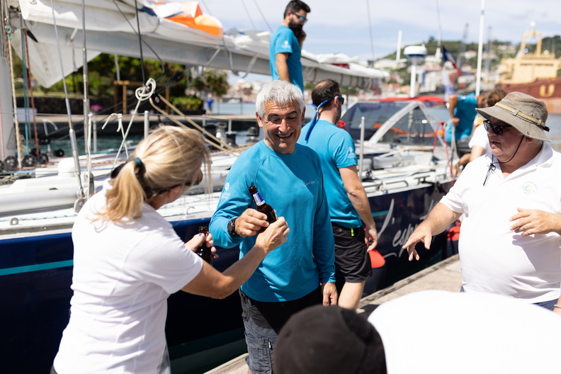 The team are welcomed ashore by Zara Tremlett, Camper & Nicholsons Port Louis Marina Manager