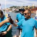 L'Esprit d'Equipe skipper Lionel Regnier celebrates their race on the dock